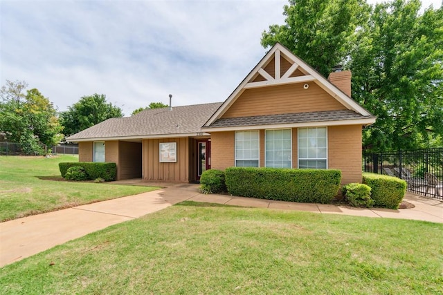 2013 Cedar Meadow Ln, Edmond, OK 73003 - view of front of house with a chimney, board and batten siding, a shingled roof, and brick siding