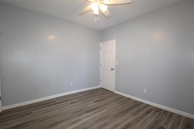 1016 N Louisa Ave, Shawnee, OK 74801 - empty room with wood finished floors, a ceiling fan, and baseboards