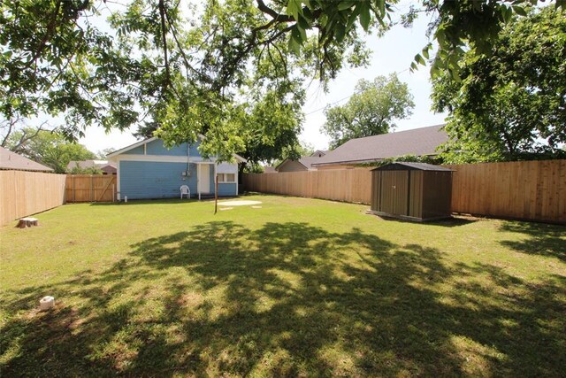 1016 N Louisa Ave, Shawnee, OK 74801 - view of yard featuring a shed and an outdoor structure