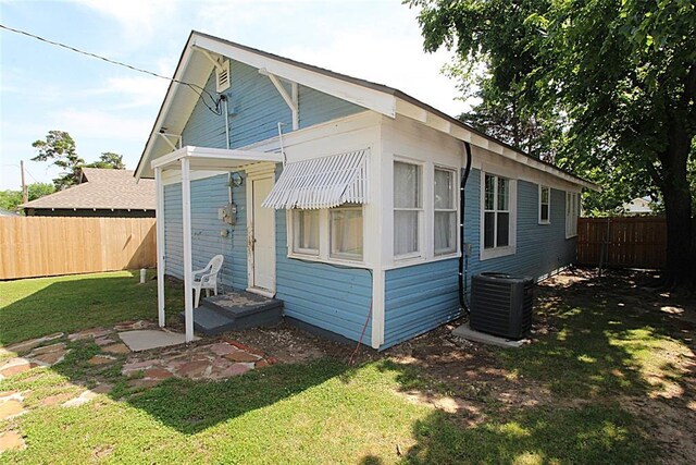 1016 N Louisa Ave, Shawnee, OK 74801 - rear view of property featuring cooling unit