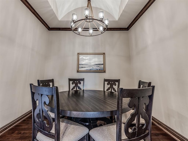 3716 Doningham Dr, Edmond, OK 73034 - dining area featuring a chandelier, crown molding, dark wood finished floors, and baseboards
