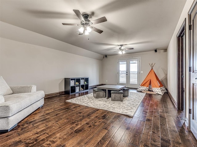 3716 Doningham Dr, Edmond, OK 73034 - living area with dark wood-type flooring, ceiling fan, baseboards, french doors, and lofted ceiling