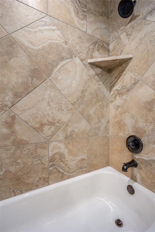 3716 Doningham Dr, Edmond, OK 73034 - bathroom view of washtub / shower combination