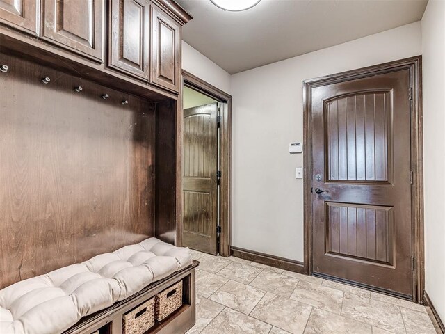 3716 Doningham Dr, Edmond, OK 73034 - mudroom featuring baseboards