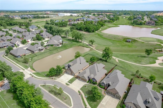 3716 Doningham Dr, Edmond, OK 73034 - aerial view of property and surrounding area with nearby suburban area, a large body of water, and a golf course