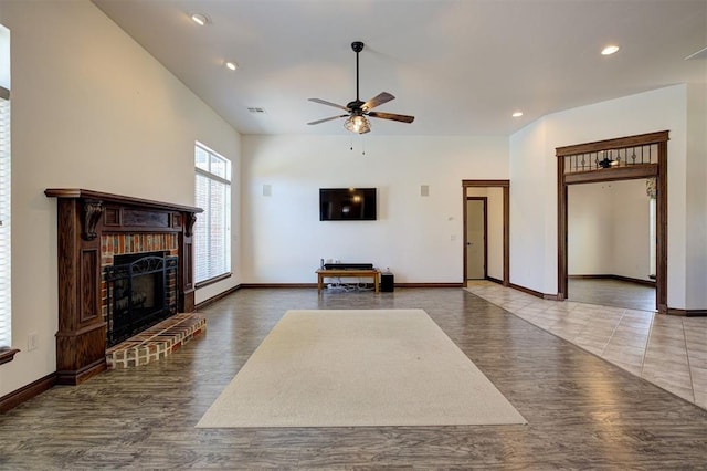 16371 Sandstone Cir, Choctaw, OK 73020 - living area with a ceiling fan, wood finished floors, recessed lighting, a fireplace, and baseboards