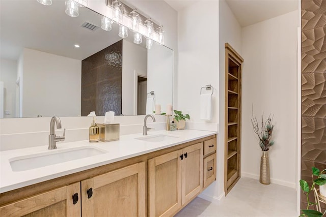 577 S Fretz Ave, Edmond, OK 73003 - bathroom featuring double vanity