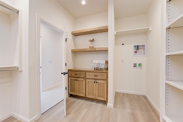 577 S Fretz Ave, Edmond, OK 73003 - laundry room with light wood-style floors, electric dryer hookup, hookup for a washing machine, and recessed lighting