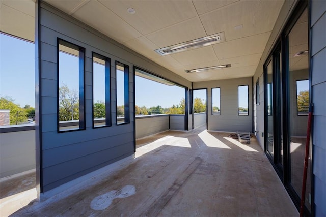 577 S Fretz Ave, Edmond, OK 73003 - unfurnished sunroom featuring plenty of natural light