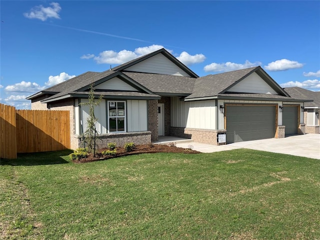 view of front facade featuring a garage, a shingled roof, concrete driveway, brick siding, and board and batten siding