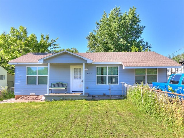 ranch-style house featuring a porch and a shingled roof