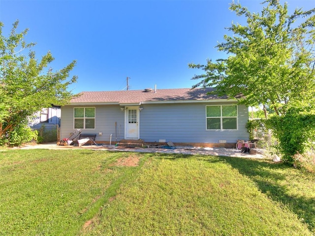 rear view of house with a patio area