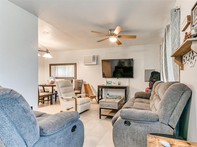 living area with a ceiling fan, a wall mounted AC, and light tile patterned floors