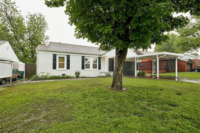 3128 NW 44th St, Oklahoma City, OK 73112 - ranch-style home featuring a carport and roof with shingles