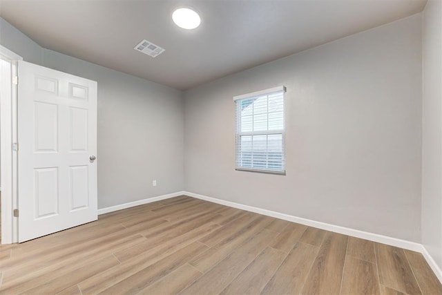 3128 NW 44th St, Oklahoma City, OK 73112 - unfurnished bedroom with light wood-style floors and baseboards