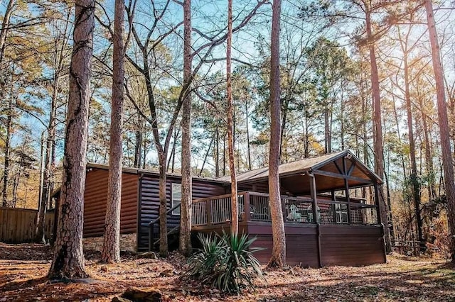 78 Lionfish Rd, Broken Bow, OK 74728 - back of house featuring faux log siding and a deck