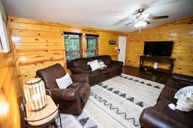 78 Lionfish Rd, Broken Bow, OK 74728 - living area featuring a ceiling fan, lofted ceiling, wood walls, and wood finished floors