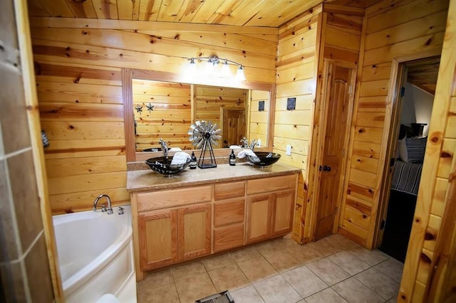 78 Lionfish Rd, Broken Bow, OK 74728 - bathroom with wooden walls, tile patterned flooring, wooden ceiling, a bath, and a sink