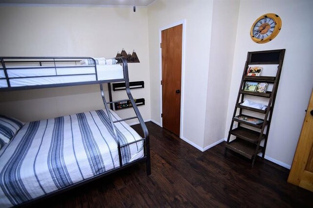 78 Lionfish Rd, Broken Bow, OK 74728 - bedroom featuring wood finished floors, baseboards, and crown molding