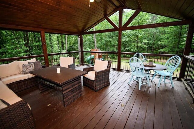 78 Lionfish Rd, Broken Bow, OK 74728 - wooden deck featuring outdoor dining space, an outdoor hangout area, and a forest view
