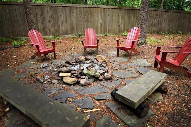 78 Lionfish Rd, Broken Bow, OK 74728 - view of patio featuring a fire pit and fence
