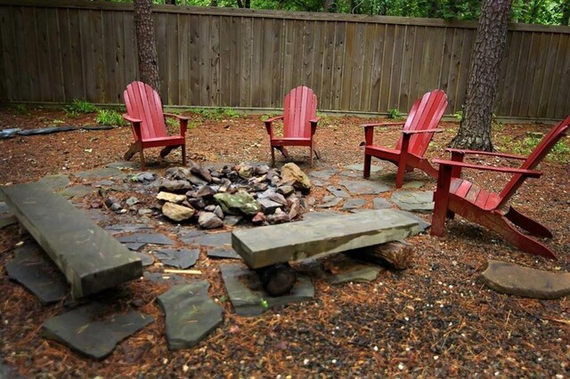 78 Lionfish Rd, Broken Bow, OK 74728 - view of yard with an outdoor fire pit and fence