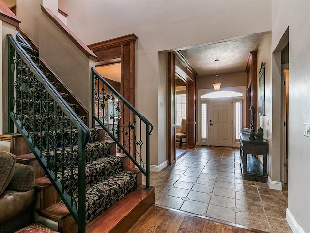 404 Nantucket Blvd, Norman, OK 73071 - entrance foyer featuring stairs and baseboards