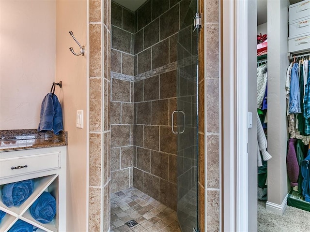 404 Nantucket Blvd, Norman, OK 73071 - full bath featuring a shower stall and a spacious closet