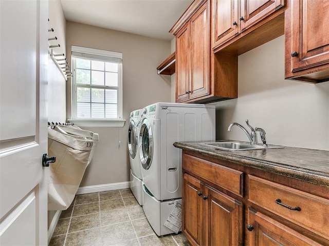 404 Nantucket Blvd, Norman, OK 73071 - laundry area with cabinet space, independent washer and dryer, and baseboards