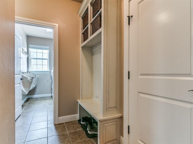 404 Nantucket Blvd, Norman, OK 73071 - mudroom featuring tile patterned floors and baseboards