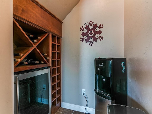 404 Nantucket Blvd, Norman, OK 73071 - wine cellar featuring wine cooler, baseboards, and tile patterned floors