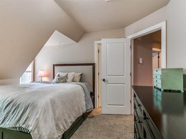 404 Nantucket Blvd, Norman, OK 73071 - carpeted bedroom featuring vaulted ceiling