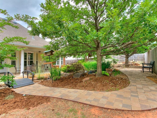 404 Nantucket Blvd, Norman, OK 73071 - fenced backyard featuring a patio
