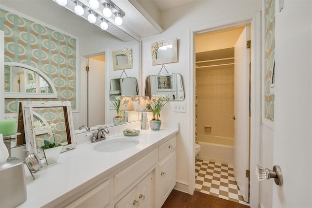 full bath with vanity, toilet, and shower / bath combination