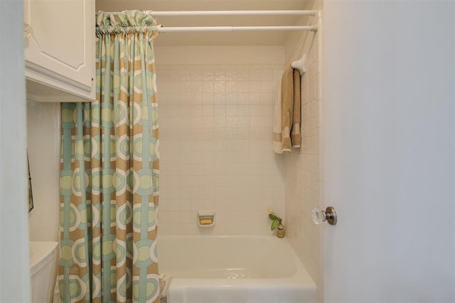 full bathroom with shower / bath combo