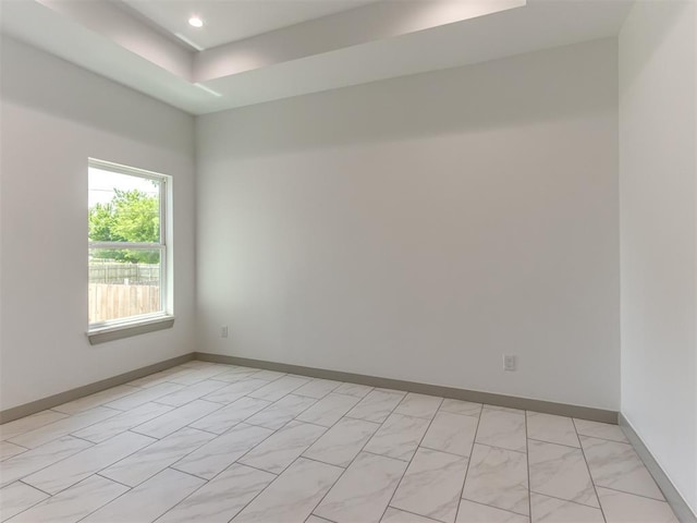 1518 NW 8th St, Oklahoma City, OK 73106 - spare room with baseboards, recessed lighting, and a raised ceiling