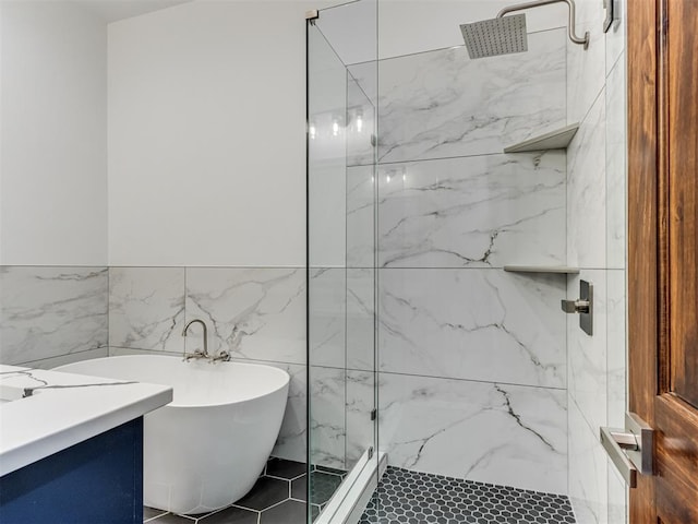1518 NW 8th St, Oklahoma City, OK 73106 - bathroom featuring a marble finish shower, tile walls, a soaking tub, and vanity