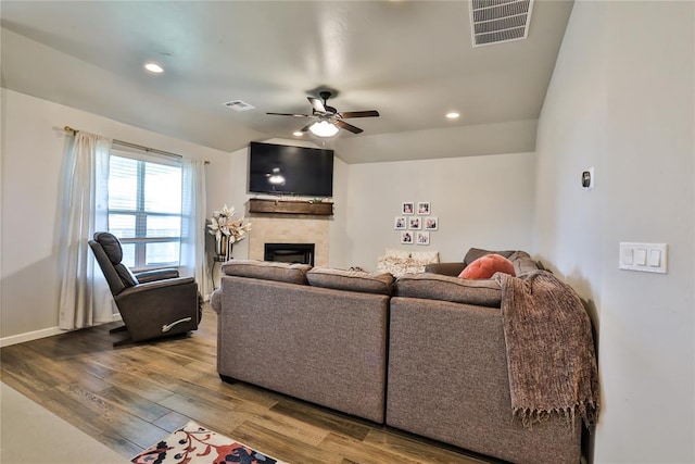 1425 NW 12th St, Newcastle, OK 73065 - living area with wood finished floors, a ceiling fan, a fireplace, recessed lighting, and baseboards