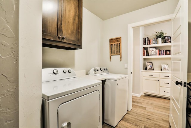 1425 NW 12th St, Newcastle, OK 73065 - laundry area featuring cabinet space, independent washer and dryer, and light wood finished floors
