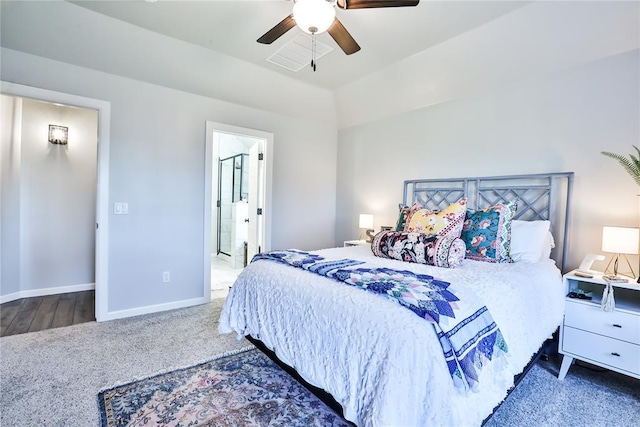 1425 NW 12th St, Newcastle, OK 73065 - carpeted bedroom with lofted ceiling, baseboards, ceiling fan, and ensuite bathroom