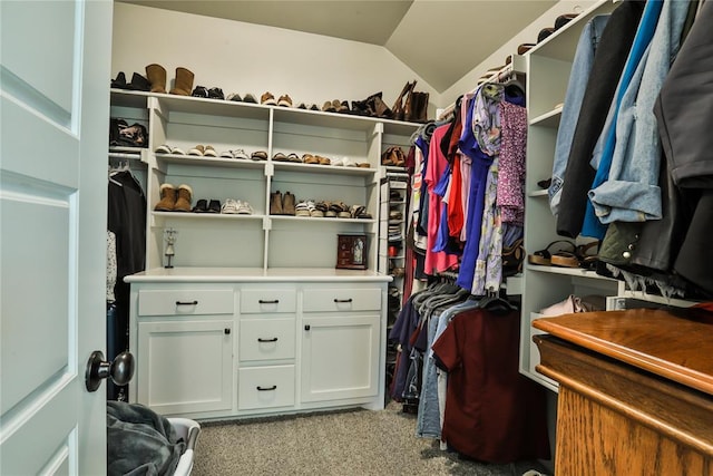 1425 NW 12th St, Newcastle, OK 73065 - walk in closet featuring carpet flooring and vaulted ceiling