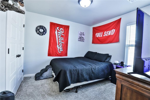 1425 NW 12th St, Newcastle, OK 73065 - bedroom with carpet floors and baseboards