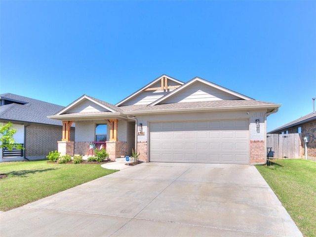 8701 Ricard Dr, Oklahoma City, OK 73135 - view of front of home with brick siding, driveway, covered porch, an attached garage, and a shingled roof