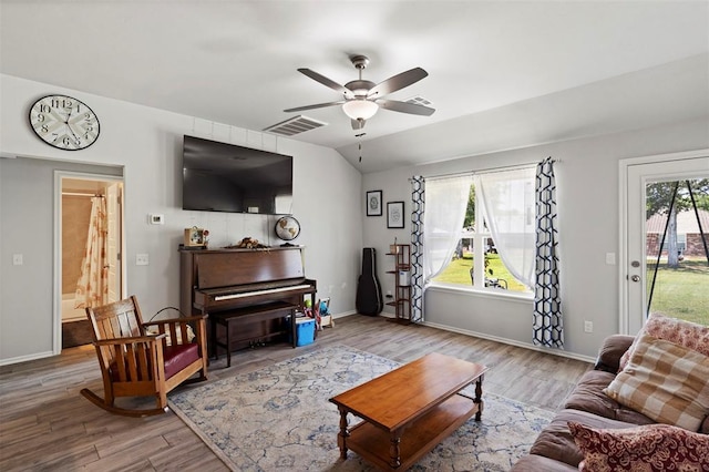 12509 NE 36th Sts, Spencer, OK 73084 - living area with a ceiling fan, wood finished floors, and baseboards