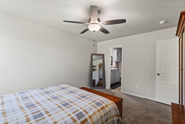 12509 NE 36th Sts, Spencer, OK 73084 - bedroom featuring carpet flooring, baseboards, a ceiling fan, and connected bathroom