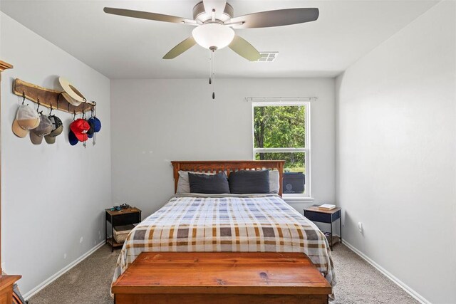 12509 NE 36th Sts, Spencer, OK 73084 - carpeted bedroom with baseboards and ceiling fan