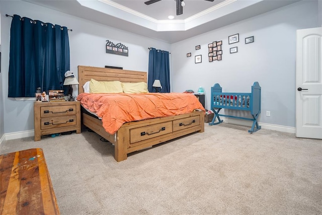 14205 Village Creek Way, Piedmont, OK 73078 - bedroom with ornamental molding, light carpet, a raised ceiling, and baseboards