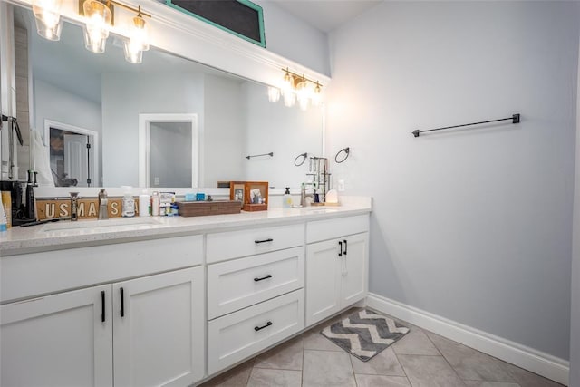 14205 Village Creek Way, Piedmont, OK 73078 - bathroom featuring double vanity, tile patterned flooring, and baseboards