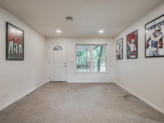 entrance foyer featuring recessed lighting and baseboards
