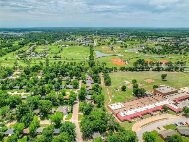 aerial view of residential area featuring a golf club